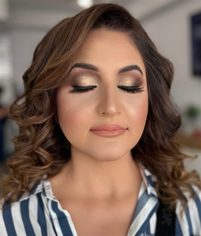 Soft glam makeup and curled hair by Social Salon